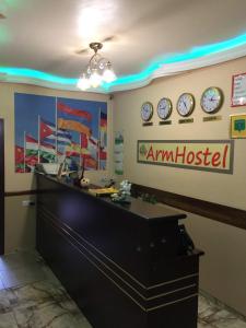 an office with clocks on the wall at Arm Hostel in Yerevan