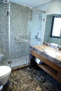 Baðherbergi á Verdun Suites Hotel