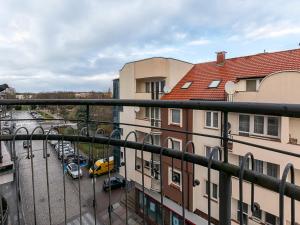 a view of a parking lot from a balcony at VacationClub - Armii Krajowej Apartament 10 in Kołobrzeg