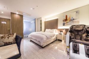 Postel nebo postele na pokoji v ubytování Guwol Hotel + 37 fotografií