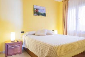 Postel nebo postele na pokoji v ubytování Les Formigues 1