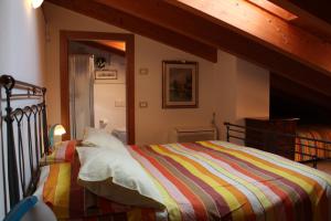 Postel nebo postele na pokoji v ubytování Bed & Breakfast Lucy