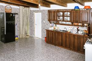 Kuchyň nebo kuchyňský kout v ubytování Daraselia Family guesthouse