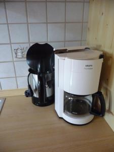 a coffee maker sitting on top of a counter at Haus Bayrhof in Hopferau