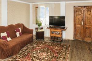 TV a/nebo společenská místnost v ubytování Daraselia Family guesthouse