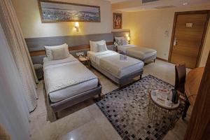 Postel nebo postele na pokoji v ubytování Nowy Efendi Hotel - Special Category + 37 fotografií