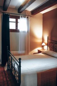 Cama o camas de una habitación en Apartaments Lo Port