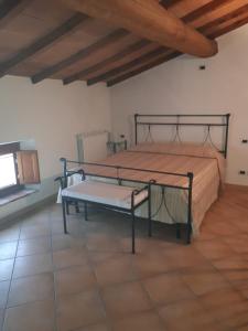 Postel nebo postele na pokoji v ubytování Residence Buca di Bacco