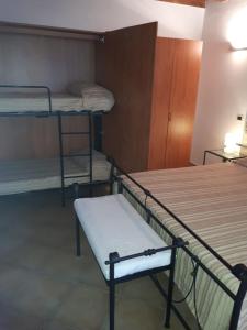 Postel nebo postele na pokoji v ubytování Residence Buca di Bacco