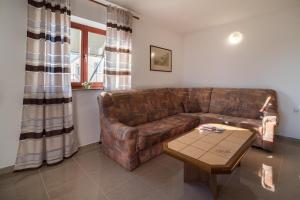 Posedenie v ubytovaní Holiday apartment Angelina with Seaview and swimming pool