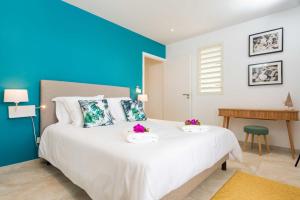 Voodi või voodid majutusasutuse Villas Rock & Beach toas
