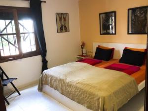 En eller flere senge i et værelse på El Descansito con Wifi gratis + 19 billeder