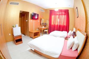 Postel nebo postele na pokoji v ubytování Arbella Boutique Hotel