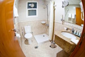 Koupelna v ubytování Arbella Boutique Hotel