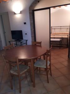 TV a/nebo společenská místnost v ubytování Residence Buca di Bacco