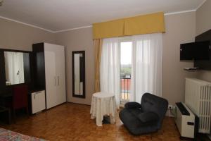 Telewizja i/lub zestaw kina domowego w obiekcie hotel ristorante vittoria
