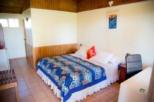 Voodi või voodid majutusasutuse Hotel Taura'a toas