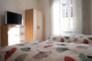 A bed or beds in a room at Alloggio Turistico al Civico n 32