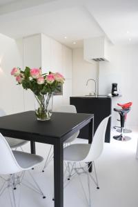 Kuchyň nebo kuchyňský kout v ubytování Leopold5 Luxe-Design Apartment