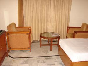 Ліжко або ліжка в номері Mansingh Palace, Ajmer