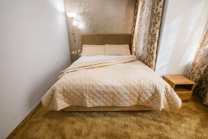 Postel nebo postele na pokoji v ubytování Hotel Andon Angelov