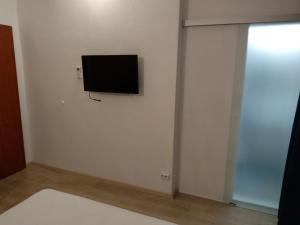 TV a/nebo společenská místnost v ubytování Apartments and Rooms Nikša