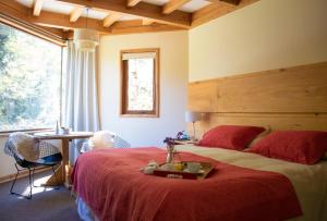 Postel nebo postele na pokoji v ubytování Hotel y Termas Huife