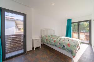 Posteľ alebo postele v izbe v ubytovaní Holiday Home Janet
