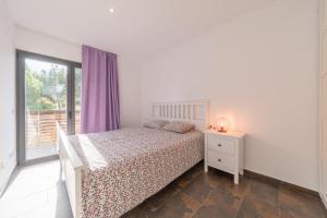 Posteľ alebo postele v izbe v ubytovaní Holiday Home Janet