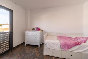 Posteľ alebo postele v izbe v ubytovaní Holiday Home Janet