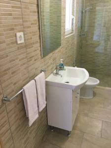Kúpeľňa v ubytovaní Apartments Kurelja + 31 fotografií