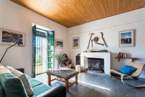 Posezení v ubytování Casa del Ingeniero , alberca 4 Hab 8 Pers 3 Chimeneas con horno