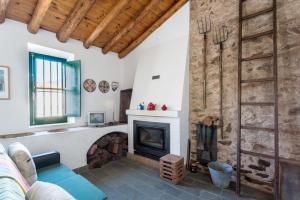 Posezení v ubytování Casa del Ingeniero , alberca 4 Hab 8 Pers 3 Chimeneas con horno