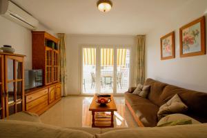 A seating area at Beach and Family