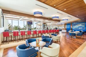 Ein Sitzbereich in der Unterkunft Margaritaville Cottages Orlando with H2O Waterpark by Rentyl