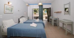 Postel nebo postele na pokoji v ubytování Katia Beach Hotel + 34 fotografií