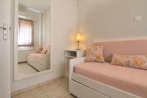 Ένα ή περισσότερα κρεβάτια σε δωμάτιο στο Like Home