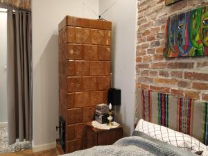 Łóżko lub łóżka w pokoju w obiekcie Krakowsky Apartment