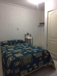 Krevet ili kreveti u jedinici u okviru objekta Hotel Lienzo Charro II