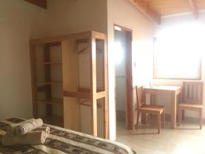Voodi või voodid majutusasutuse Hostal Pablito 2 toas