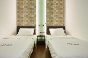 Katil atau katil-katil dalam bilik di DREAM LUXURY HOTEL