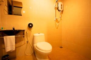 Koupelna v ubytování De Botani Hotel