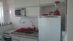 Una cocina o zona de cocina en Solaris Residencial Clube