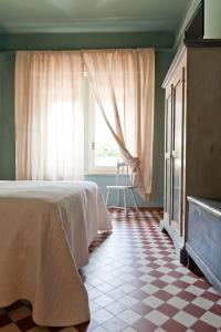Voodi või voodid majutusasutuse Hotel Stresa toas