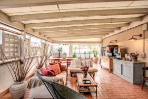 a living room with couches and a table at City Guest House in Rome