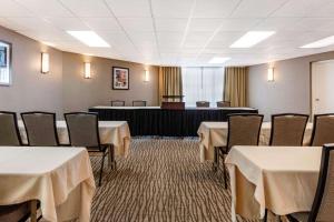 a banquet room with tables and chairs and a podium at Comfort Inn Memphis Downtown in Memphis