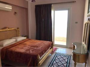 Кровать или кровати в номере Dahab Hotel