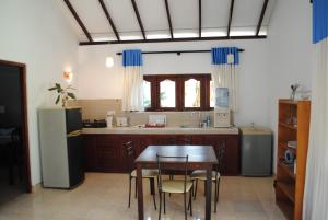 Kuchyň nebo kuchyňský kout v ubytování Sujeewani Villa
