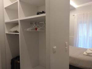 Posteľ alebo postele v izbe v ubytovaní FLOW - White Tower Two Bedroom Suite