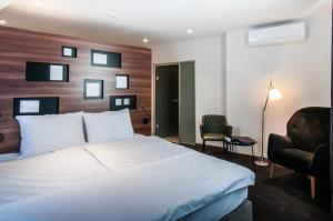 Postel nebo postele na pokoji v ubytování Best Western Premier Natalija Residence